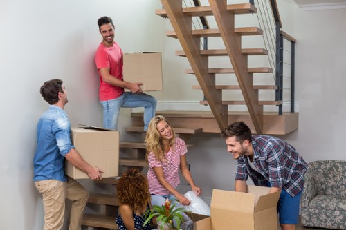 Removal team planning a move in Uxbridge residential street