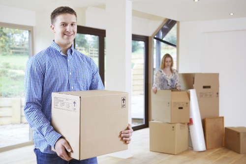 Packed boxes and moving equipment ready for a local relocation