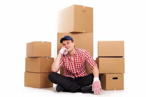 Packed boxes and furniture ready for a local house move in Uxbridge